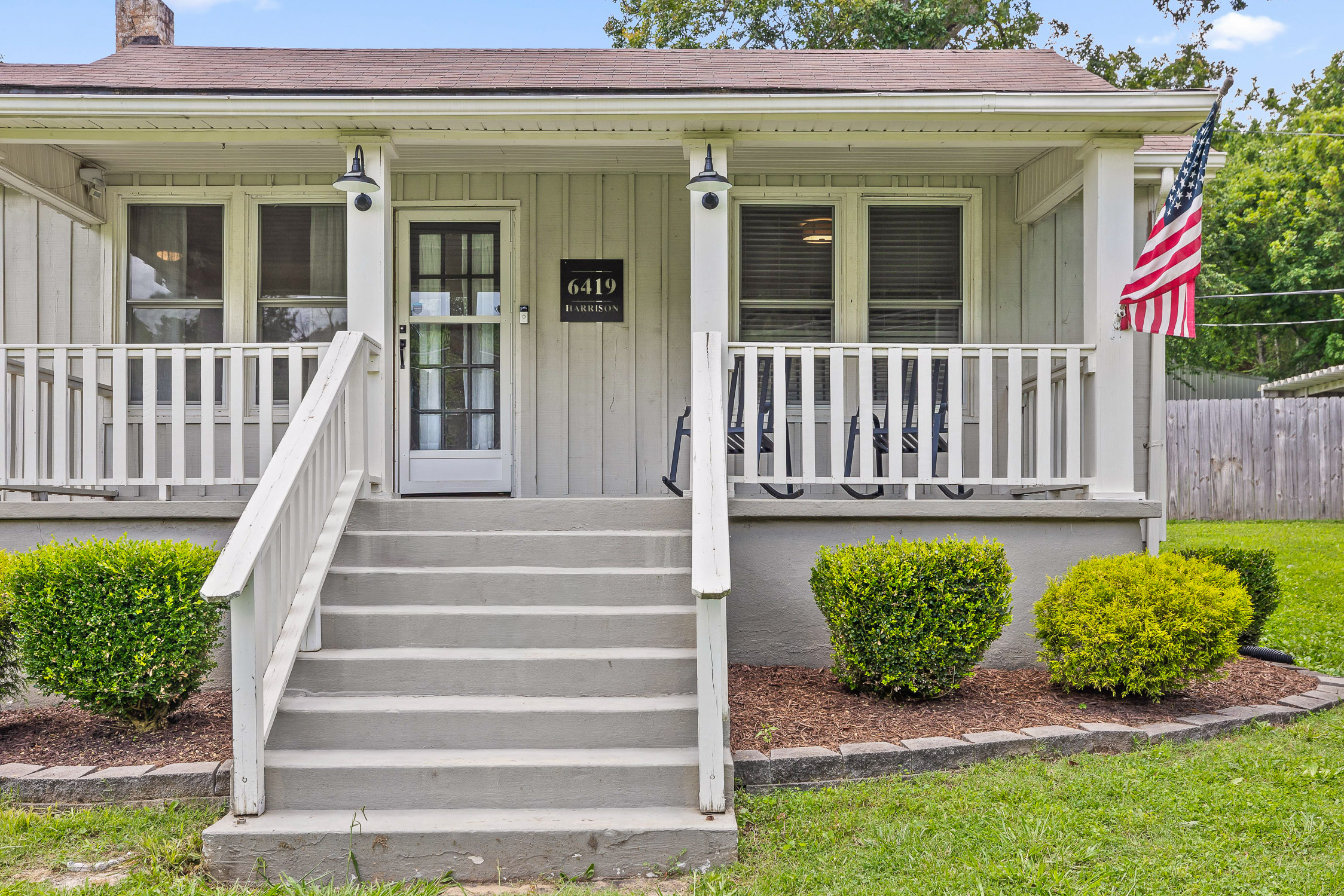 Front porch and entrance with 6419 address